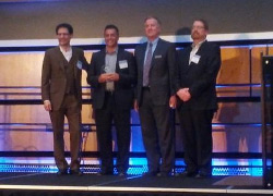 Pandell President & CEO, Greg Chudiak (second from left), accepted the award Tuesday evening
