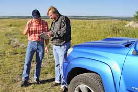 Land Experts Using Landscape Stakeholders on an iPad