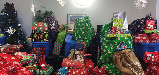 Christmas presents piled up in the Pandell office kids' room