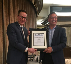 Pandell CEO Greg Chudiak accepts the T. Cathy Miller Champion Award